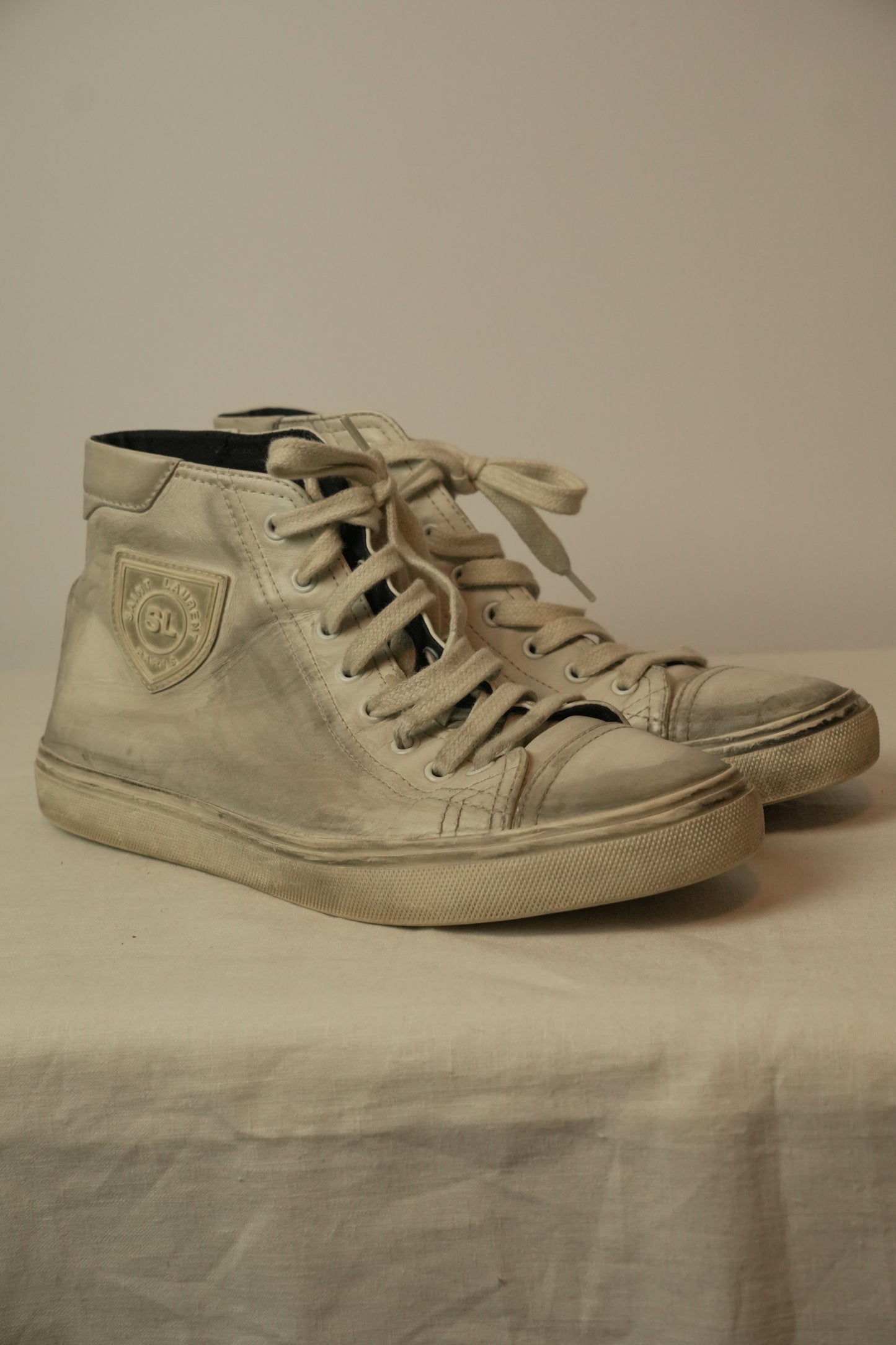 Saint Laurent High Top Distressed Leather Sneakers