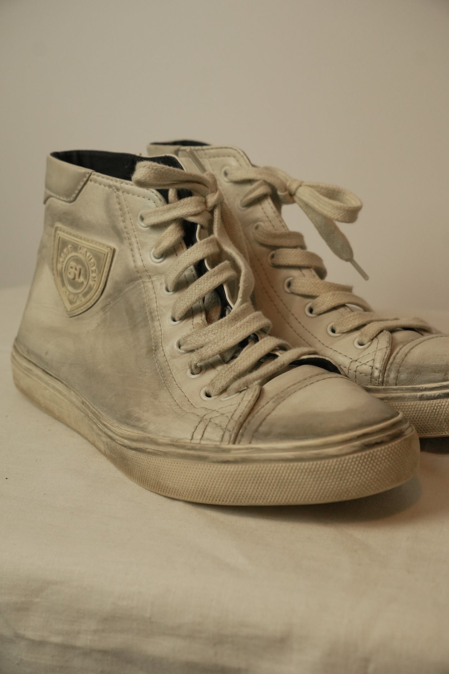 Saint Laurent High Top Distressed Leather Sneakers