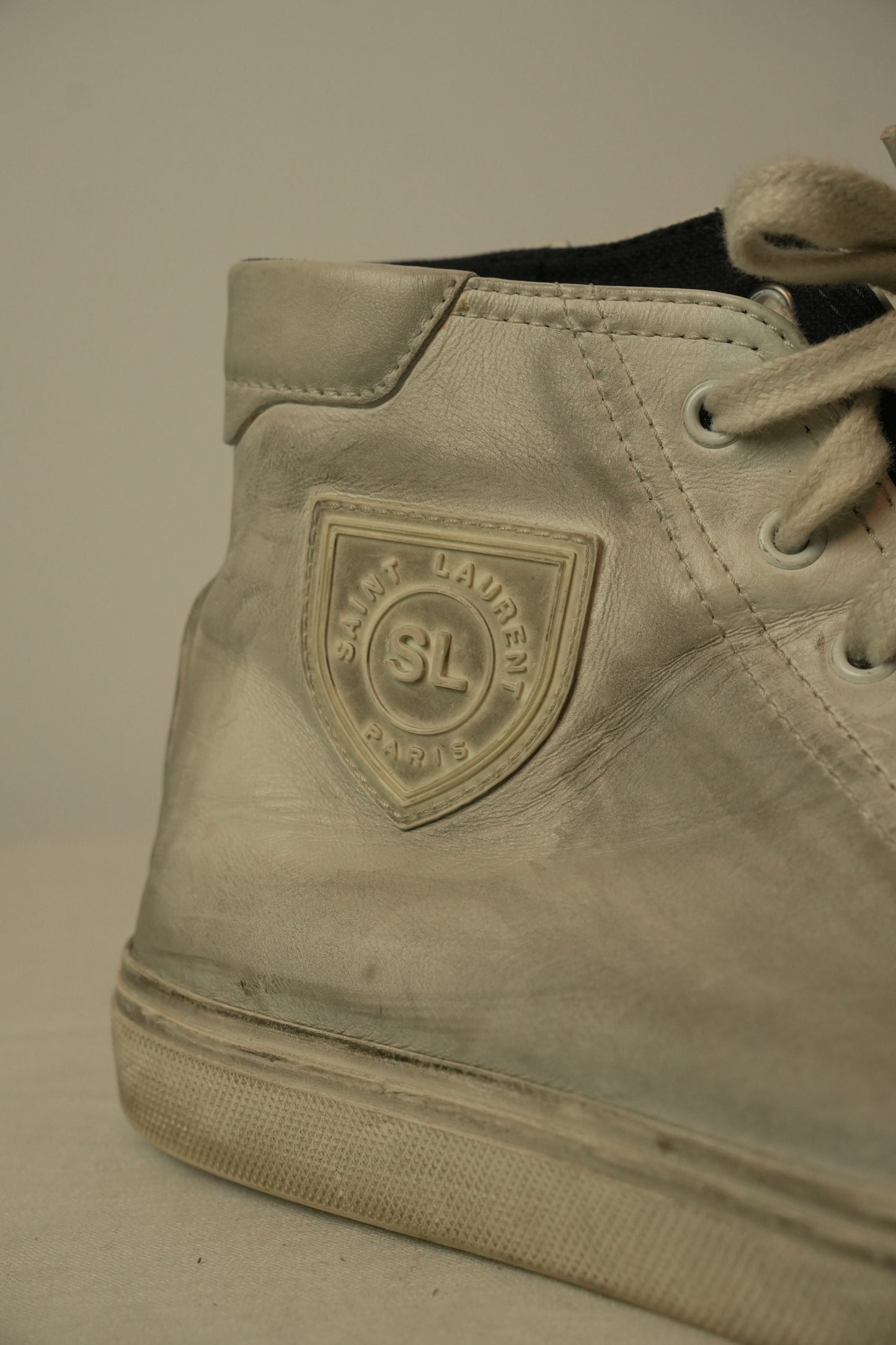 Saint Laurent High Top Distressed Leather Sneakers