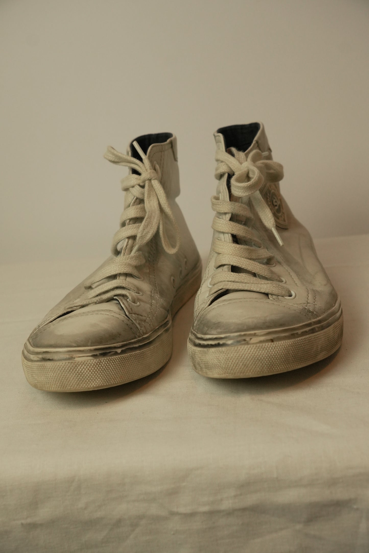 Saint Laurent High Top Distressed Leather Sneakers
