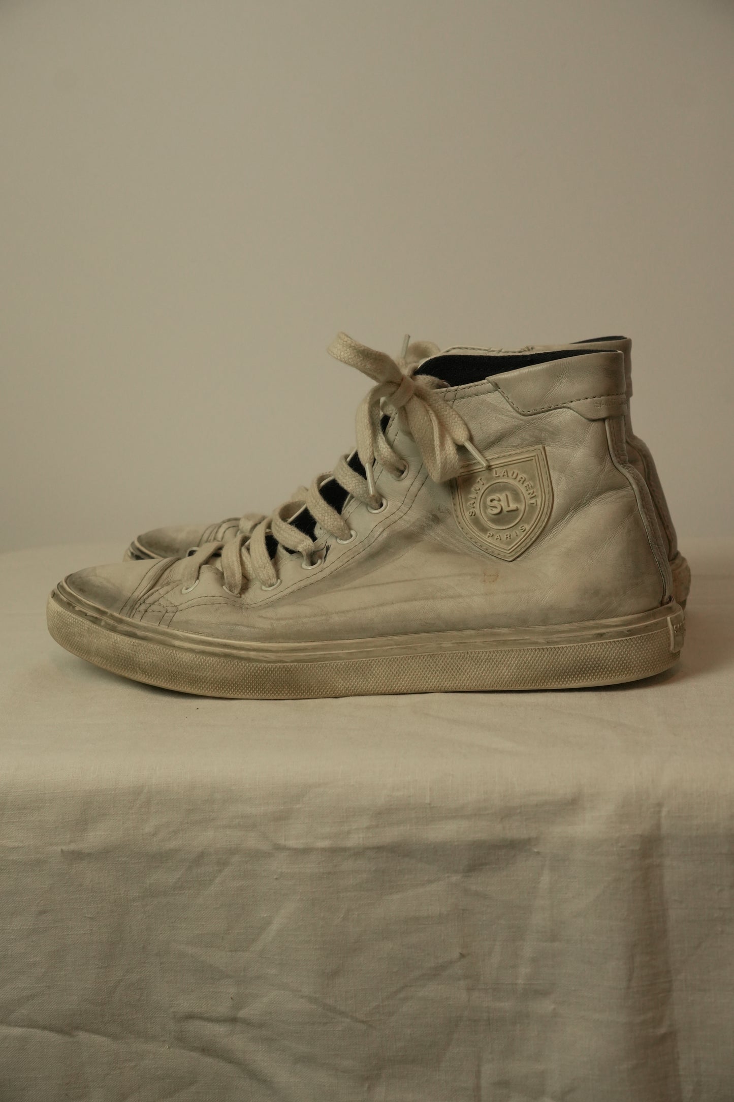 Saint Laurent High Top Distressed Leather Sneakers