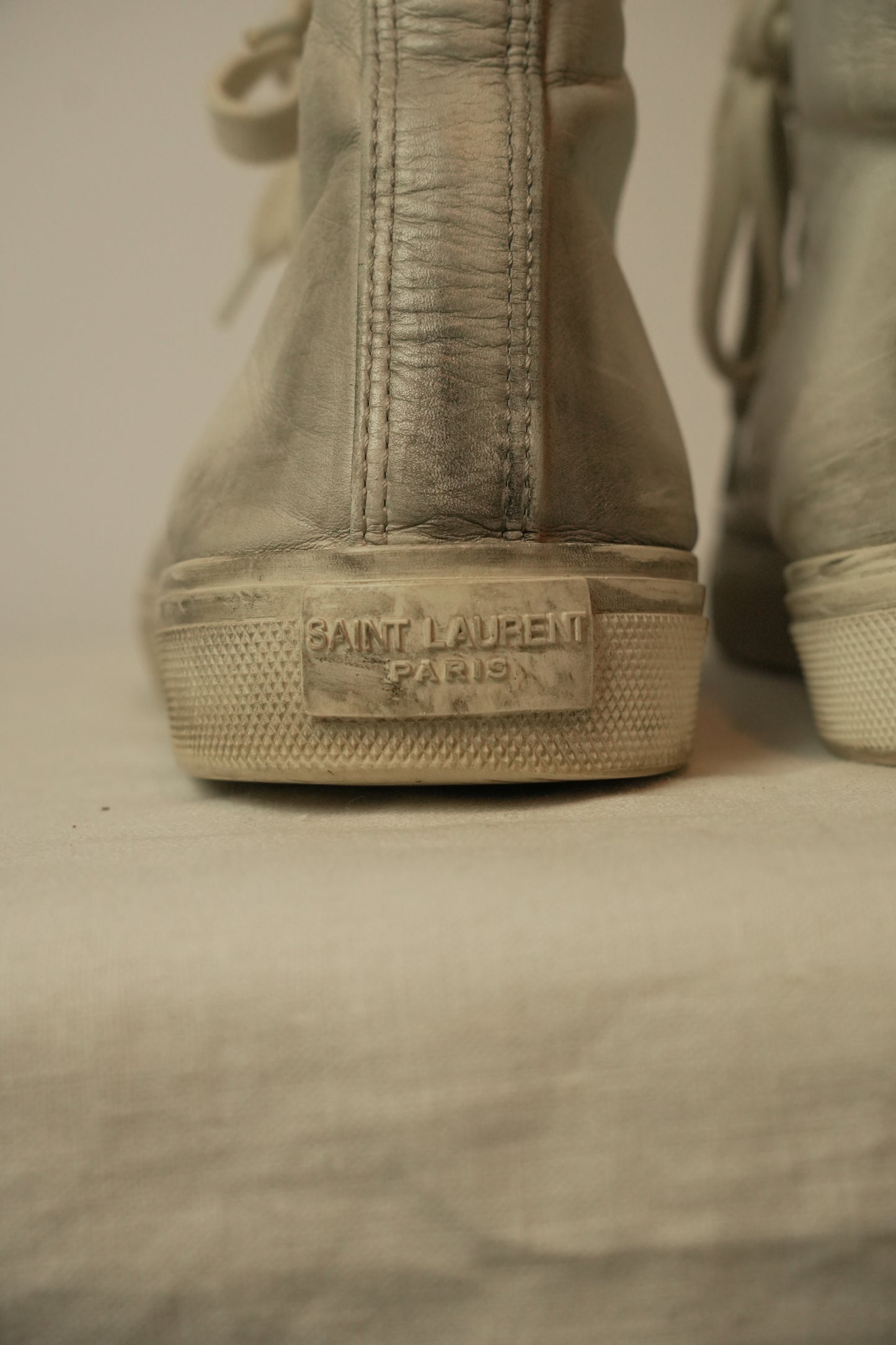 Saint Laurent High Top Distressed Leather Sneakers