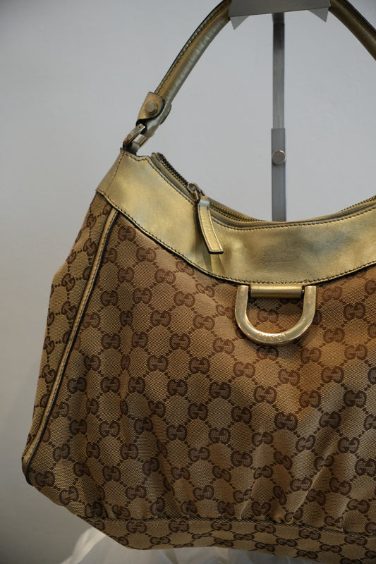 Gucci Monogram Gold Abbey Leather Handbag