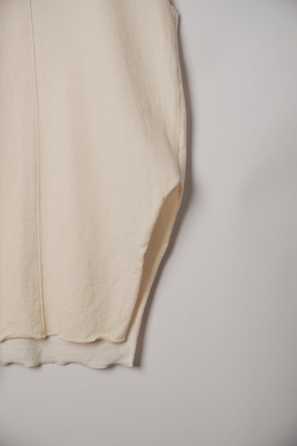 Studio Nicholson Sleeveless Merino Wool Vest with Asymmetric Slit