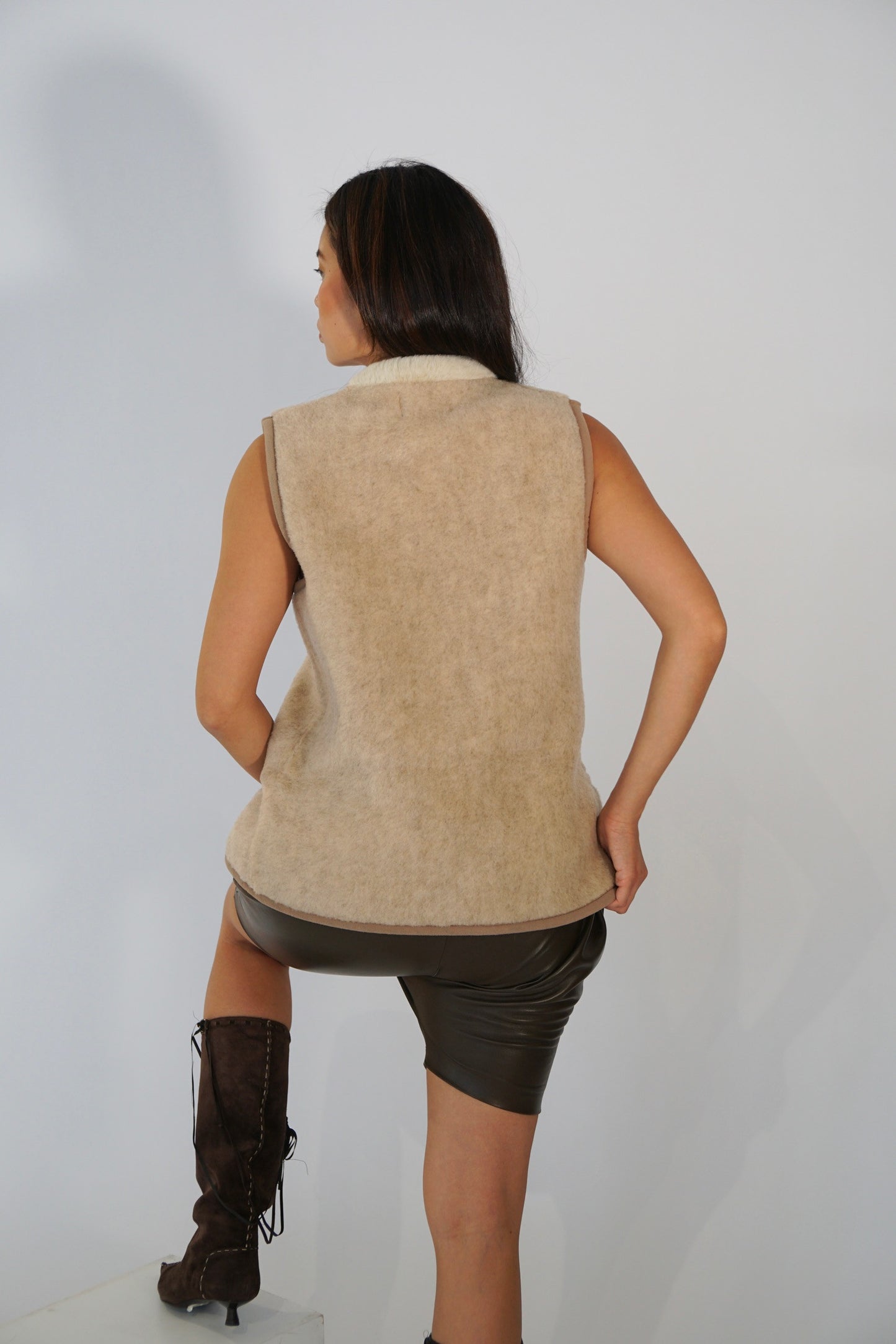 Balenciaga wool shearling sleeveless fur vest w frog closure